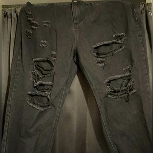 Black ripped jeans. Open pockets, high waist